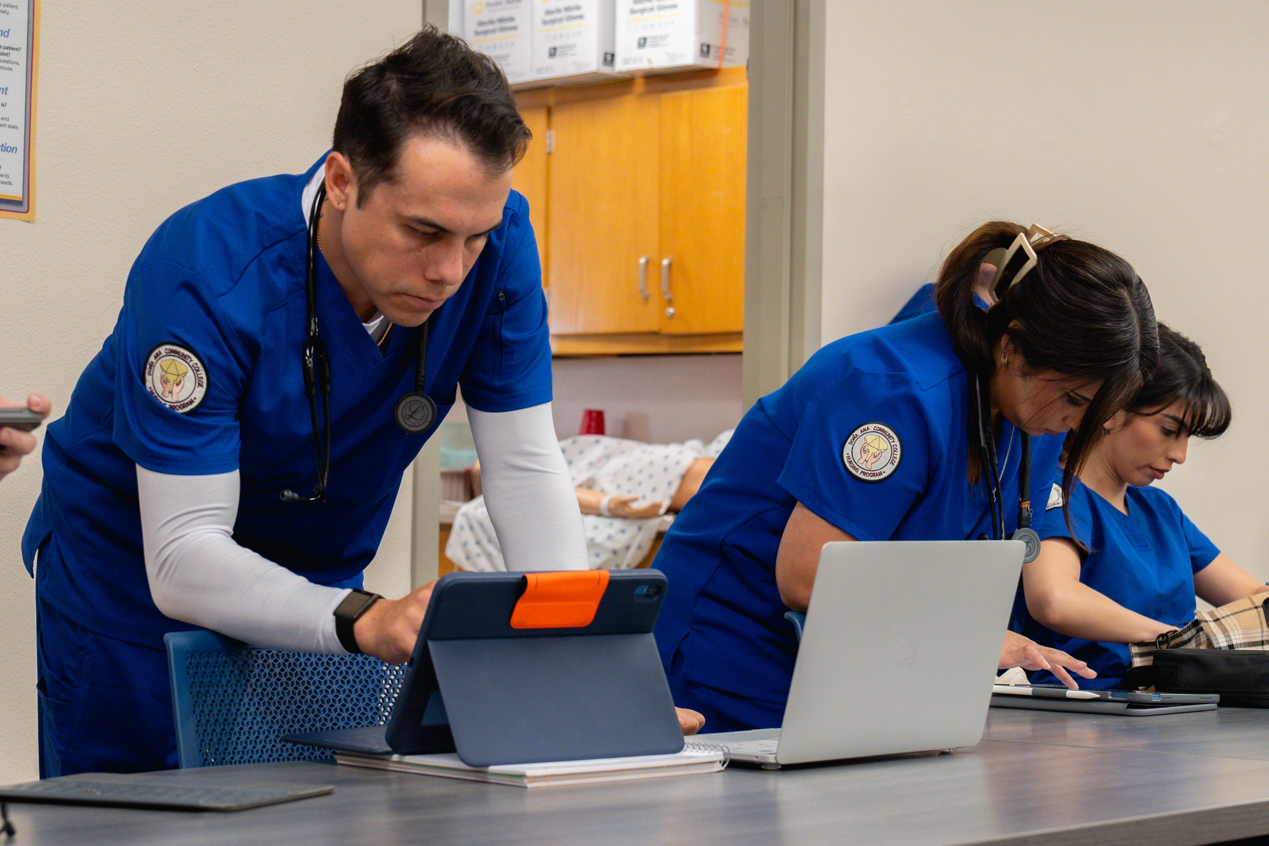 Nursing students using ipads to register data